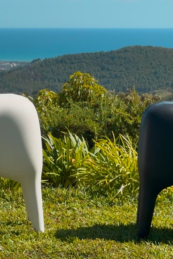 Goodnight Light SHEEP sculpture and seat in white outdoors in garden setting, designed by Marke Newton Barcelona